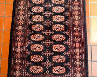70 HandKnottedBlackElephantsFootBukaraRug