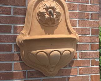 Terracotta Wall Fountain with Floral Motif