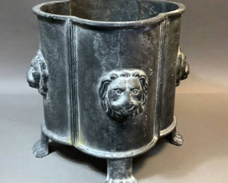 Lot 178: Cast Iron Lion Head Planter