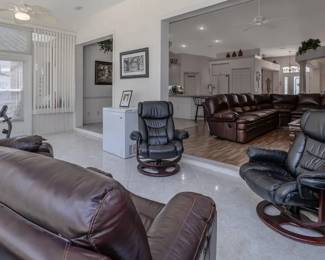 2 leather swivel recliners w/foot stools (not shown), leather recliners
