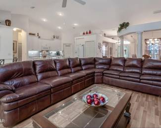Large chocolate brown sectional sofa w/recliners