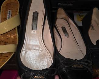 PRADA Black Patent Leather Ballerina Flats with Bow and Metallic Logo Detail