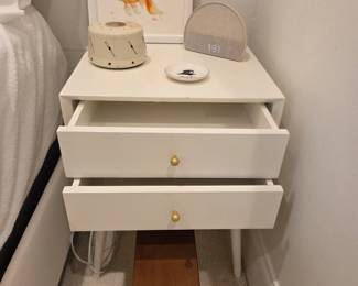 Modern White Two-Drawer Nightstand with Brass Knobs and Tapered Legs
