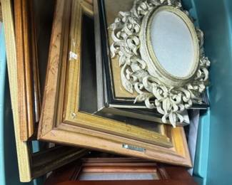 Many picture frames of different styles