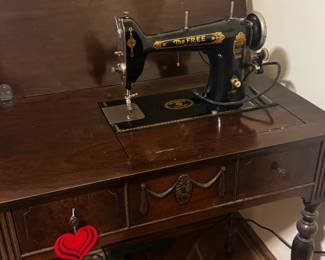 One of two antique sewing machines
