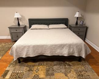 King-sized upholstered bed with new Casper mattress, two bedside tables wired for charging your devices, matching lamps and two 8 x 10 area rugs.