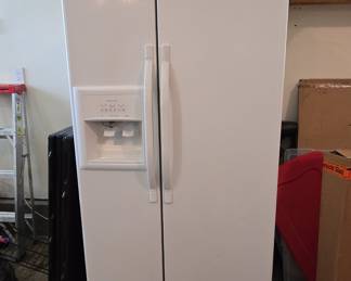 White Side-by-Side Refrigerator with Ice and Water Dispenser