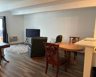Recliners, kitchen table, chairs, TV and other living room furniture