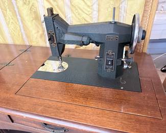 Singer sewing machine in table