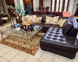 Leather sectional, glass and iron table