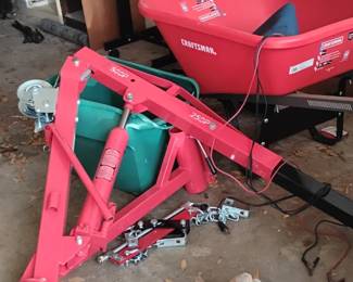 Hoist and new wheel barrow