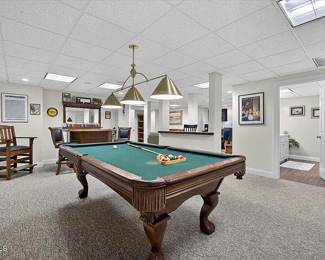 Stunning Brunswick CAMDEN II Pool Table with Ball and Claw feet, as well as Fringe with Tassel Pockets. This is part of a Brunswick Pool Collection of Furniture