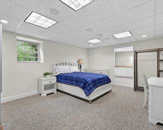 White platform bed with drawers