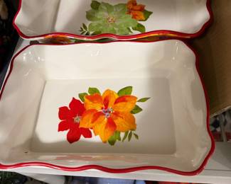 The Pioneer Woman brand casserole dishes featuring a Christmas poinsettia holiday design with ruffled edges