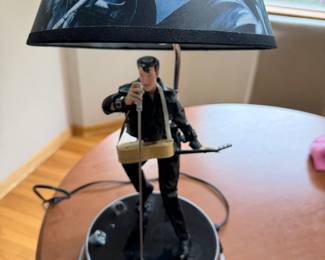 vintage KNG America "Elvis is" animated musical table lamp featuring a rotating Elvis figure