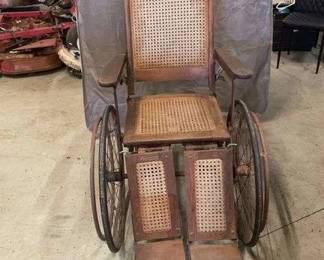Antique Caned Wheel Chair