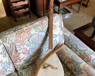 $250.00.  GUSLE, a traditional Balkan single-stringed folk instrument, featuring a carved animal head at the top of the neck.The sound box of this instrument is typically covered with animal skin, such as goat skin, and it is played with a curved bow.