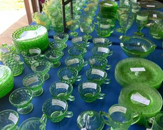 Two 8 foot tables with green (uranium) glass, and yellow glass - different patterns