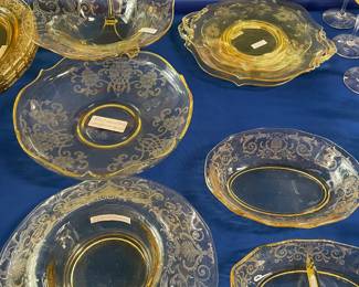 Two 8 foot tables with green (uranium) glass, and yellow glass - different patterns