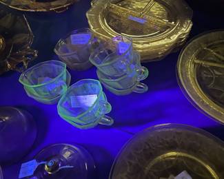 Two 8 foot tables with green (uranium) glass, and yellow glass - different patterns