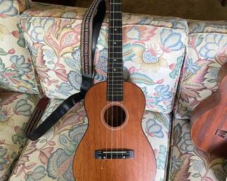 $250.  Mahogany Concert Ukulele. It features a brown mahogany wood finish and includes a patterned strap.The instrument is 23 inches long, making it a standard concert size