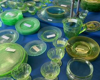 Two 8 foot tables with green (uranium) glass, and yellow glass - different patterns
