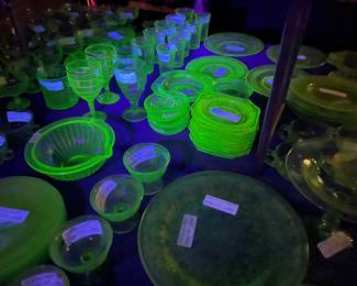 Two 8 foot tables with green (uranium) glass, and yellow glass - different patterns