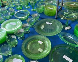 Two 8 foot tables with green (uranium) glass, and yellow glass - different patterns