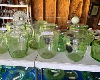 Two 8 foot tables with green (uranium) glass, and yellow glass - different patterns