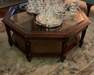 $200 mid-century walnut octagon coffee table with rattan lower shelf, matching end table