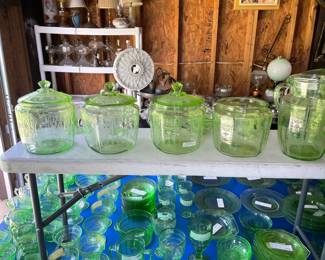 Two 8 foot tables with green (uranium) glass, and yellow glass - different patterns