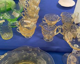 Two 8 foot tables with green (uranium) glass, and yellow glass - different patterns