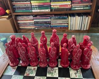 $100 chess pieces only.  Ceramic chess pieces (black and red)