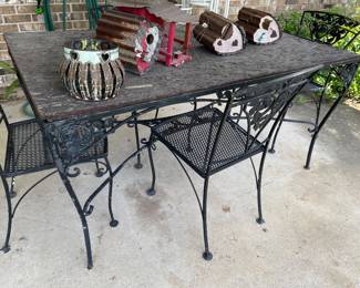 $600 set (taking into account that it needs glass). Vintage R.Woodard wrought iron table and chairs with mesh style top. This table needs a new piece of glass