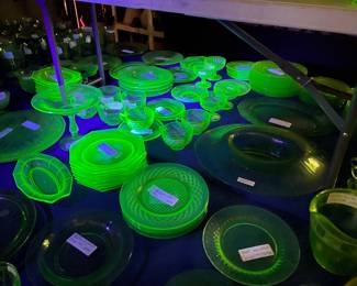 Two 8 foot tables with green (uranium) glass, and yellow glass - different patterns