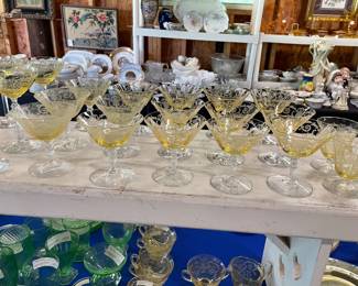 Two 8 foot Two 8’ tables with green (uranium) glass, and yellow glass - different patterns