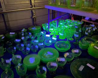 Two 8 foot tables with green (uranium) glass, and yellow glass - different patterns