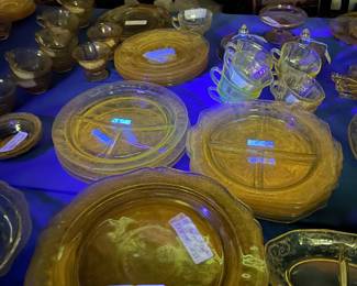 Two 8 foot Two 8’ tables with green (uranium) glass, and yellow glass - different patterns