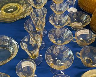 Two 8 foot tables with green (uranium) glass, and yellow glass - different patterns