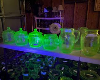 Two 8 foot tables with green (uranium) glass, and yellow glass - different patterns