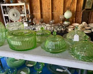 Two 8 foot tables with green (uranium) glass, and yellow glass - different patterns