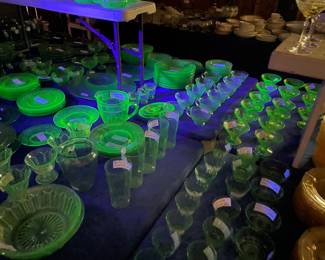 Two 8 foot tables with green (uranium) glass, and yellow glass - different patterns