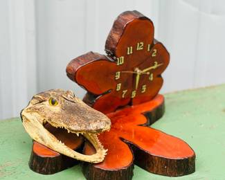 Taxidermy alligator head mounted on live edge, wood clock