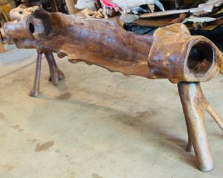 Stunning hand carved sculptural, solid wooden bench made from one piece of wood