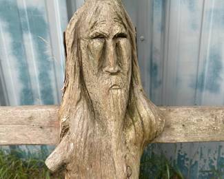 Vintage crucifix mounted on a wooden cross