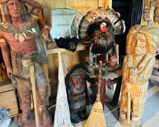 Hand-carved wooden sculptures: cigar store Indian style statue 