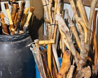 Hundreds of hand crafted walking sticks 