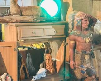 This sale is full of treasures, including this 5+' American Indian Carving 