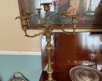 This piece is really great.  Heavy, antique brass candelabra 