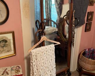 Heavy, wrought iron floor mirror